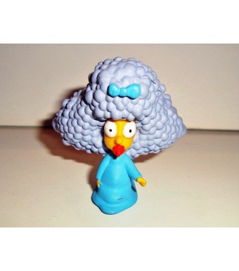 FIGURINE LES SIMPSON - MAGGIE AFRO (5x5cm)